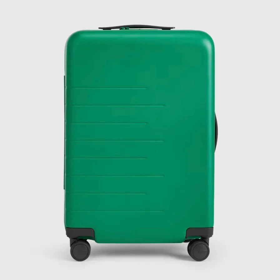 Green suitcase travel